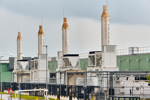Middenmeer Netherlands 17 May 2026 View of Microsoft datacenters western europe on Agriport along the A7 with tall exhaust stacks and industrial infrastructure under a cloudy sky.