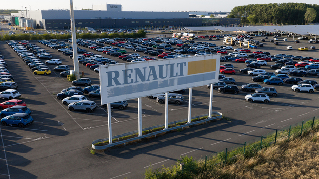 Lambres lez Douai France 07 July 2026 Aerial view of the Renault factory parking lot filled with numerous new cars with the AESC France facility visible in the background.