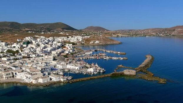 Aerial view of a coastal town with harbor and boats Greece. Aerial view of a coastal town with harbor and boats Greece.