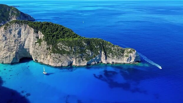 Aerial view of Navagio Beach and limestone cliffs Greece.