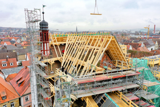 Aerial view of Rathaus Forchheim under renovation with scaffolding and new wooden roof trusses Forchheim Bayern Germany. Aerial view of Rathaus Forchheim under renovation with scaffolding and new wooden roof trusses Forchheim Bayern Germany.