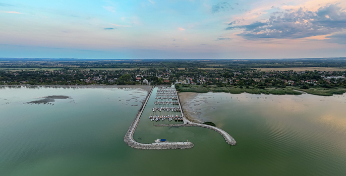 Aerial view of Balatonfenyves marina on Lake Balaton at low water levels at dusk in summer Aerial view of Balatonfenyves marina on Lake Balaton at low water levels at dusk in summer