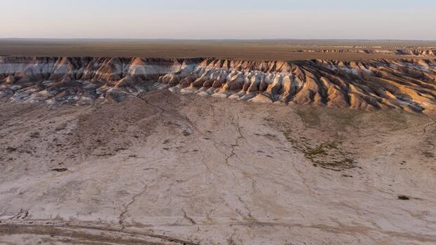 Aerial view of the layered cliffs of Mount Bokty Kazakhstan.