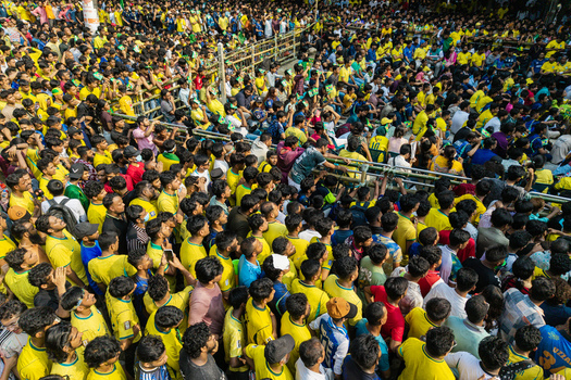 Dhaka Bangladesh 20 June 2026 Aerial view of a large crowd of people wearing yellow shirts gathered at Dhaka University Campus in Dhaka Bangladesh with spectators watching an event. Dhaka Bangladesh 20 June 2026 Aerial view of a large crowd of people wearing yellow shirts gathered at Dhaka University Campus in Dhaka Bangladesh with spectators watching an event.