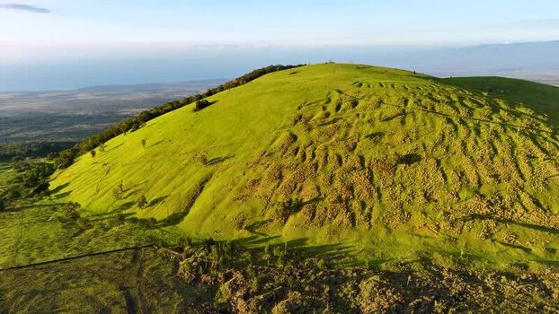Aerial view of Puu Waawaa cinder cone and lush green slopes United States. Aerial view of Puu Waawaa cinder cone and lush green slopes United States.