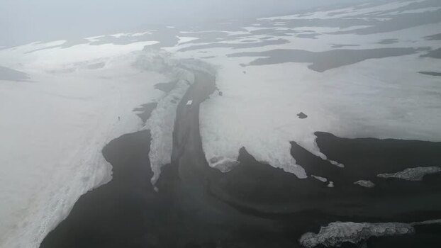 Aerial view of snowy volcanic slopes of Mount Etna Italy. Aerial view of snowy volcanic slopes of Mount Etna Italy.