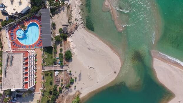 Aerial view of a resort with a heart shaped pool Albania.
