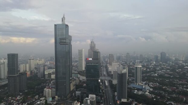 Aerial view of skyscrapers and urban skyline in Jakarta Indonesia. Aerial view of skyscrapers and urban skyline in Jakarta Indonesia.