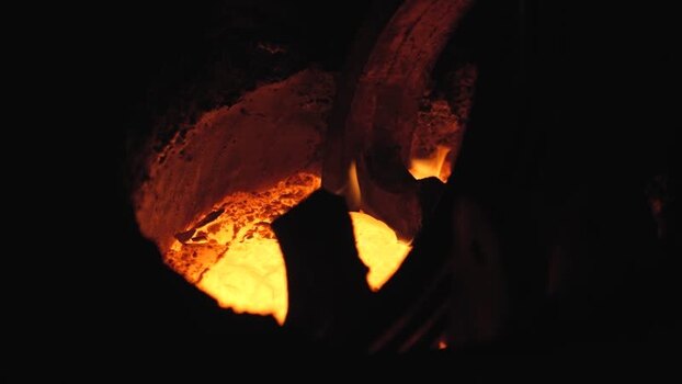 View of molten metal glowing in a furnace in Bogura Bangladesh.