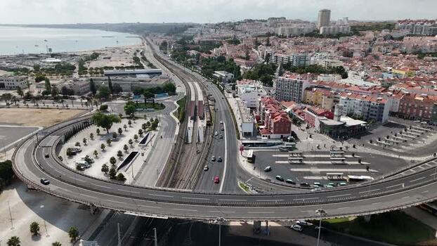 Aerial view of Alges highway interchange and railway Portugal.