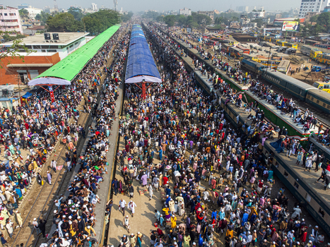 Tongi Bangladesh 04 February 2024 Aerial view of Tongi Junction railway station crowded with thousands of people on platforms and train roofs during a major event. Tongi Bangladesh 04 February 2024 Aerial view of Tongi Junction railway station crowded with thousands of people on platforms and train roofs during a major event.