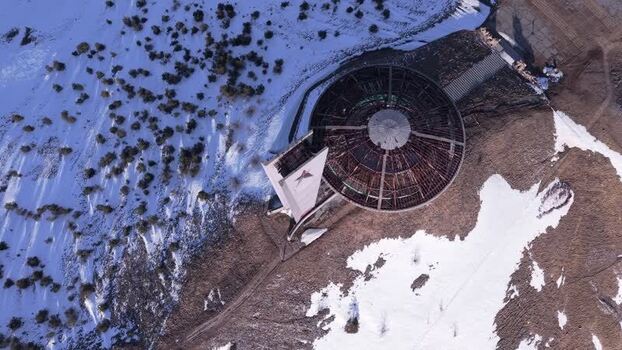 Aerial view of the abandoned Buzludzha Monument Bulgaria.