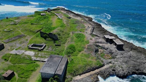 Aerial view of coastal fort ruins in Mauritius.