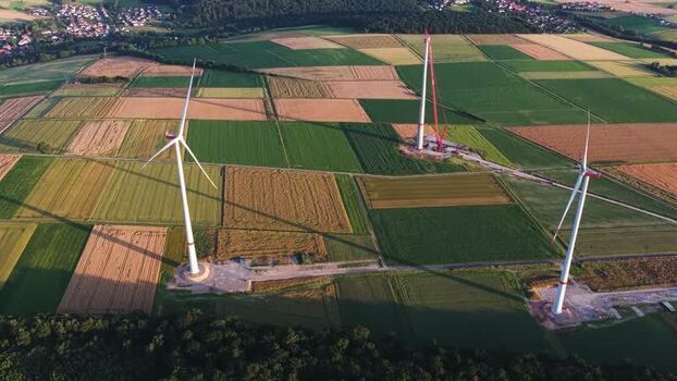Aerial view of wind turbines in rural fields Germany. Aerial view of wind turbines in rural fields Germany.