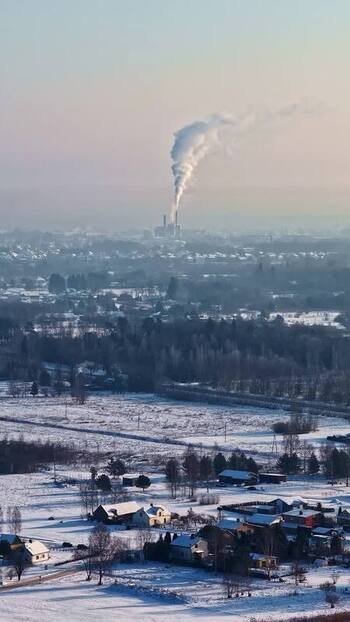 Aerial view of power plant over snowy landscape Latvia.