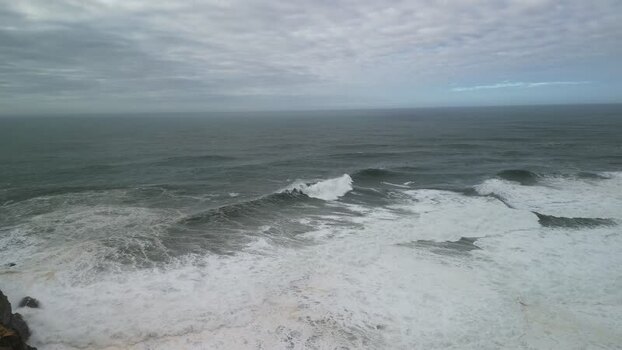 Aerial view of crashing waves near the coast Portugal. Aerial view of crashing waves near the coast Portugal.