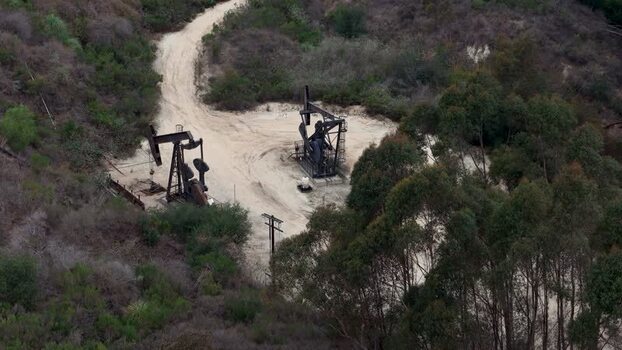 Aerial view of oil pump jacks in Baldwin Hills United States.