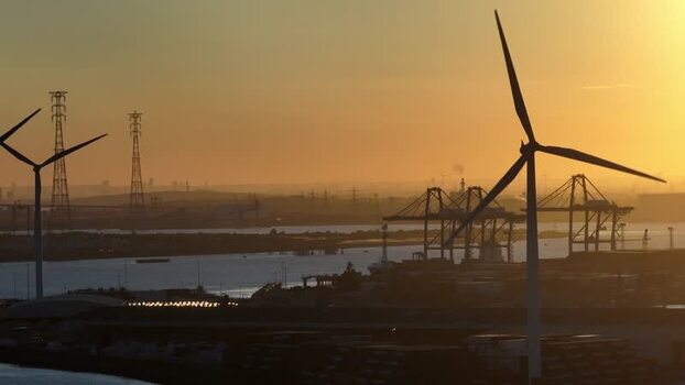 Aerial view of Tilbury Docks with wind turbines United Kingdom.