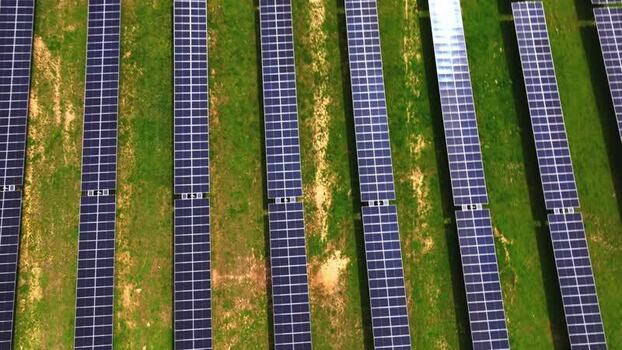 Aerial view of solar panels on a green field in Lebanon United States. Aerial view of solar panels on a green field in Lebanon United States.