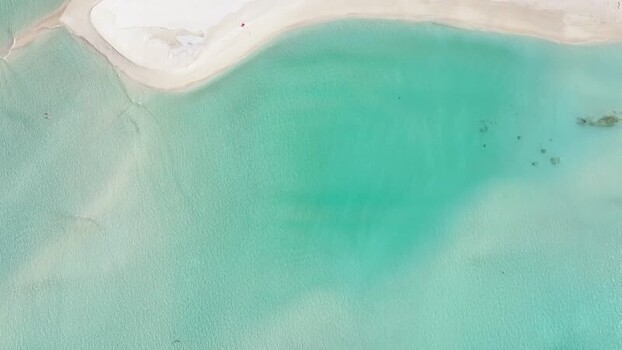 Aerial view of the white sand beach and turquoise lagoon Maldives. Aerial view of the white sand beach and turquoise lagoon Maldives.