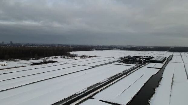 Aerial view of snow covered land Netherlands.