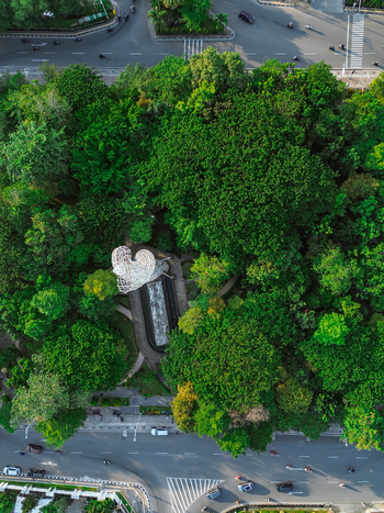 Aerial view of Taman Samarendah surrounded by lush green trees and urban roads in Samarinda East Kalimantan Indonesia. Aerial view of Taman Samarendah surrounded by lush green trees and urban roads in Samarinda East Kalimantan Indonesia.
