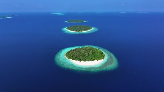 Aerial view of tropical islands in the ocean Maldives. Aerial view of tropical islands in the ocean Maldives.