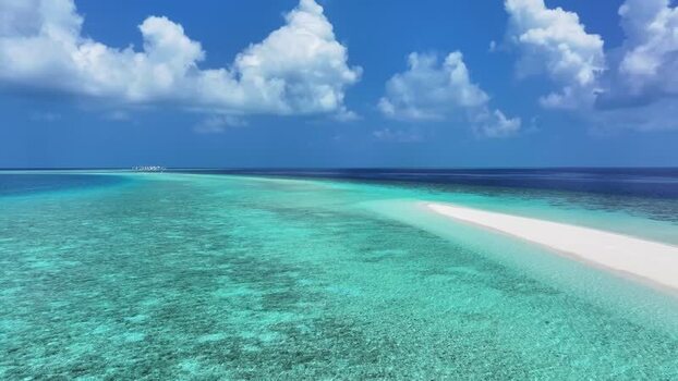 Aerial view of a white sandbar and turquoise coral reefs Maldives. Aerial view of a white sandbar and turquoise coral reefs Maldives.