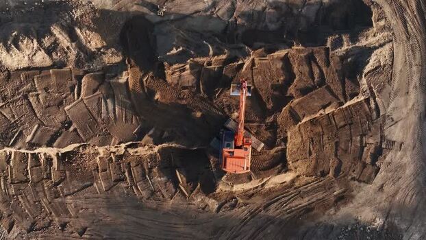 Aerial view of excavator at work in a quarry Netherlands.