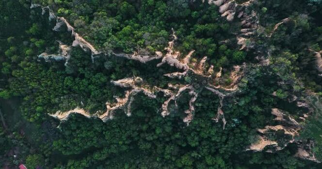 Aerial view of the Balze del Valdarno rock formations and forest Italy. Aerial view of the Balze del Valdarno rock formations and forest Italy.