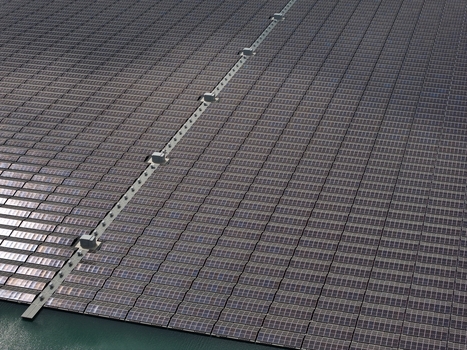 Aerial view of a large floating solar farm installed on a calm body of water in the Netherlands. Aerial view of a large floating solar farm installed on a calm body of water in the Netherlands.