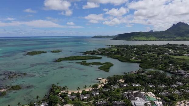 Aerial view of Ile aux Cerfs and turquoise lagoon Mauritius.