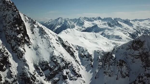 Aerial view of snowy peaks in Baqueira Spain.