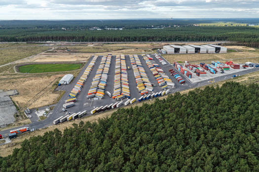 Grunheide Mark Brandenburg Germany 07 September 2026 Aerial view of Trailer Yard North with rows of parked semi trailers and shipping containers near a dense forest. Grunheide Mark Brandenburg Germany 07 September 2026 Aerial view of Trailer Yard North with rows of parked semi trailers and shipping containers near a dense forest.