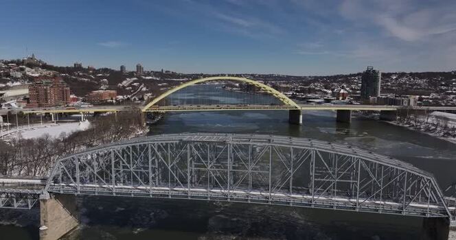 Aerial view of bridges over the Ohio River in winter United States. Aerial view of bridges over the Ohio River in winter United States.
