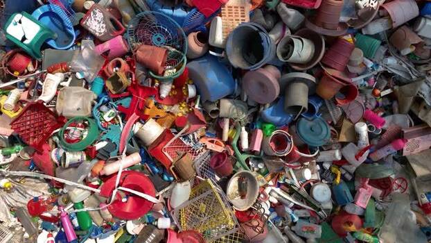 View of a large pile of plastic waste in Bogura Bangladesh. View of a large pile of plastic waste in Bogura Bangladesh.