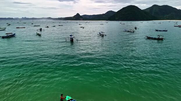 Aerial view of fishing boats in a bay Indonesia.
