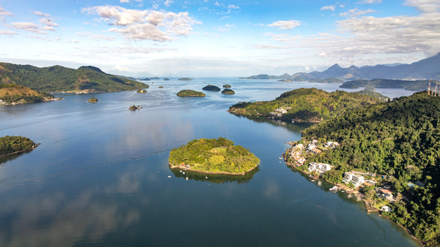 Aerial view of the lush green islands and calm blue waters of the bay in Angra dos Reis Rio de Janeiro Brazil.