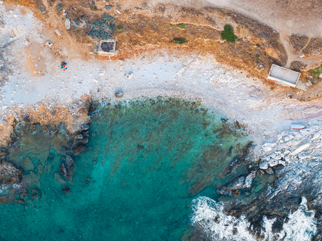 Aerial view of the turquoise waters and rocky coastline of Riserva Naturale Orientata dello Zingaro in San Vito Lo Capo Sicilia Italy. Aerial view of the turquoise waters and rocky coastline of Riserva Naturale Orientata dello Zingaro in San Vito Lo Capo Sicilia Italy.