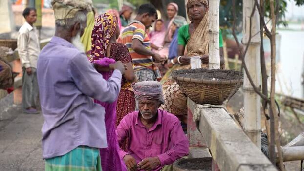 View of people gathered at Aminbazar market in Dhaka Bangladesh.