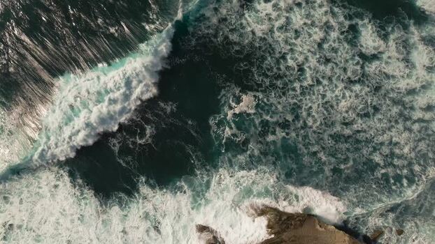 Aerial view of ocean waves crashing at La Jolla Cove United States.