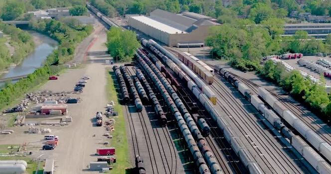 Aerial view of freight train cars in a rail yard United States. Aerial view of freight train cars in a rail yard United States.