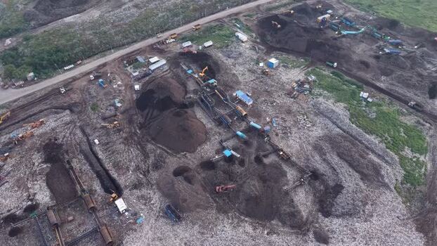 Aerial view of waste recycling processing unit in India. Aerial view of waste recycling processing unit in India.