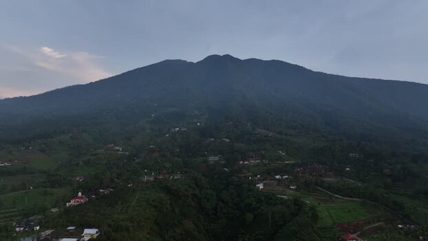 Aerial view of Joglo Java Neglasari and mountains Indonesia. Aerial view of Joglo Java Neglasari and mountains Indonesia.