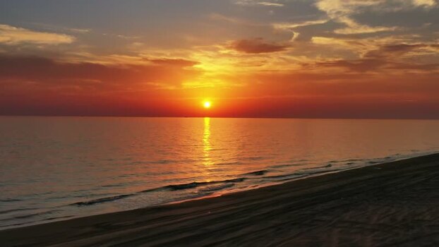 Aerial view of golden sunset over the sea Montenegro. Aerial view of golden sunset over the sea Montenegro.