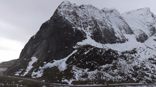 Aerial view of snow covered mountains in Lofoten Norway.