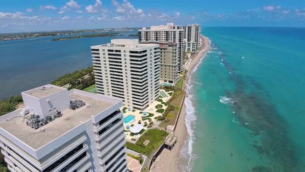 Aerial view of Singer Island buildings and coastline United States. Aerial view of Singer Island buildings and coastline United States.