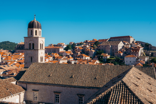 View of the historic terracotta rooftops and the Franciscan Monastery bell tower in the Dubrovnik Old Town Dubrovnik Dubrovnik Neretva County Croatia. View of the historic terracotta rooftops and the Franciscan Monastery bell tower in the Dubrovnik Old Town Dubrovnik Dubrovnik Neretva County Croatia.