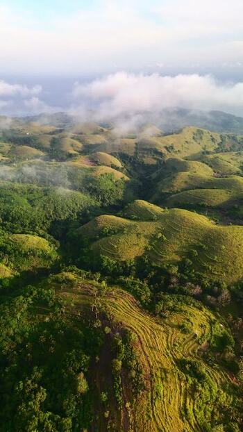 Aerial view of Teletubbies Hill with rolling green mounds Indonesia. Aerial view of Teletubbies Hill with rolling green mounds Indonesia.