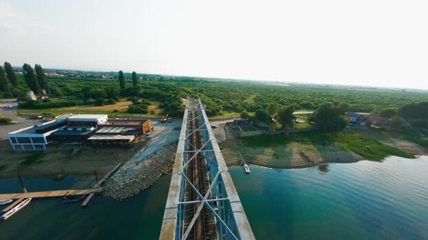 Aerial FPV view of the bridge over the river Serbia. Aerial FPV view of the bridge over the river Serbia.